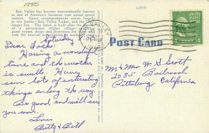 Automobiles roadside Challenger Inn 1950s Postcard Sun Valley Idaho Moore 21-820