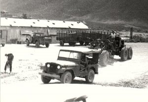 1960s VIETNAM WAR ARMY BASE JEEP TRUCKS SOLDIER PHOTO RPPC POSTCARD 43-190