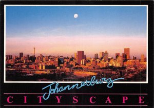 US6013 johannesburg transvaal south africa moon above city