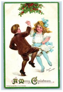 c1910's Merry Christmas Girl And Boy Dancing Holly Brundage Embossed Postcard 