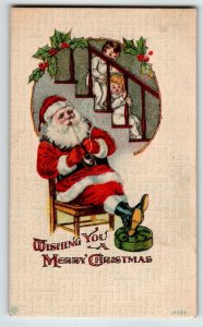 Santa Claus Christmas Postcard Saint Nick Smoking Pipe Seated As Kids Watch 6073