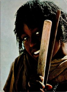 VINTAGE CONTINENTAL SIZE POSTCARD BEAUTIFUL NATIVE WOMAN OF ETHIOPIA MAILED 1977