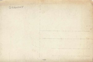 German Soldier & Cleric Candle Stick Table Real Photo Postcard