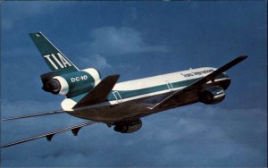 Trans Int'l Airlines DC-10 Airplane Jet Airliner Vintage Postcard