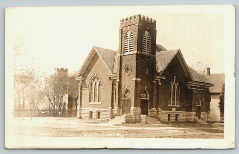 Olin Iowa~Methodist Church~Cows in the Back Yard by Fence~House~1912 RPPC 