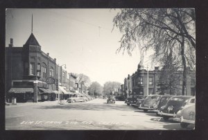 RPPC CRESCO IOWA DOWNTOWN ELM STREET SCENE OLD CARS REAL PHOTO POSTCARD