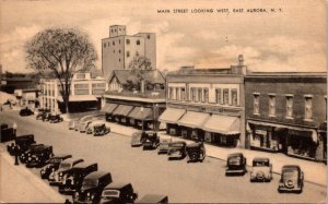 VINTAGE POSTCARD MAIN STREET LOOKING WEST EAST AURORA N.Y. ANTIQUE CARDS STORES