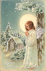Christmas Angel Praying Full Moon Embossed c1900s-10s Postcard