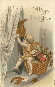 Embossed New Year Postcard Ser.266 Cherub Hangs Gold Heart in Window, Germany