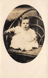 1910s RPPC Real Photo Postcard Baby On Wooden Chair