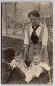 RPPC Young Woman with Two Babies in Wicker Carriage Postcard H23
