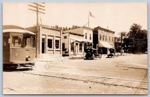 K44/ Onalaska Wisconsin RPPC Postcard c1910 Trolley Stores Bank 239