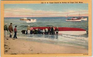 CAPE COD, MA   US COAST GUART in ACTION Capsized Boat on Beach c1940s   Postcard