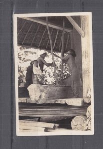 INDONESIA, SUMATRA, BATAK WOMEN POUNDING RICE, c1920 real photo ppc., unused.