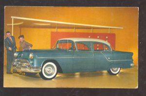 1955 OLDSMOBILE ROCKET 88 VINTAGE CAR DEALER ADVERTISING POSTCARD 4 DOOR