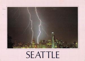 BR98903 lightning strikes over the seattle skyline by night