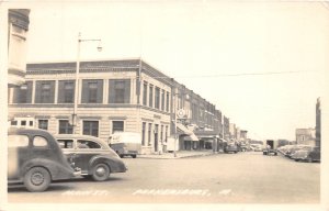 J46/ Parkersburg Iowa RPPC Postcard c1940s Main Street Stores Autos  71