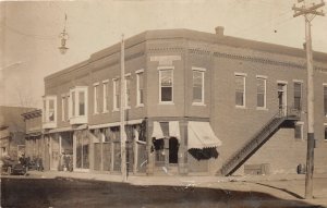 G13/ Osceola Iowa RPPC Postcard 1914 Stores People Corner