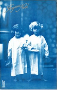 Postcard French Christmas blue tint Children in nightgown with candlestick