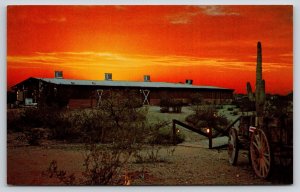 Tucson Arizona~Triple C Ranch~Sunset Scene~Lamps~Cactus~Wagon~1950s Postcard