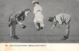 Two men bending over Oddities 1908 