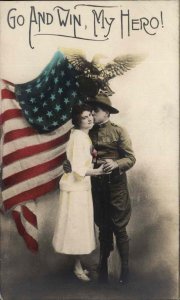 WWI Soldier Kissing Woman Go and Win Patriotic Tinted RPPC PC