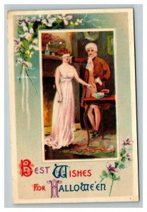 Vintage 1900's Winsch Back Halloween Postcard Man & Woman Playing Game Floral