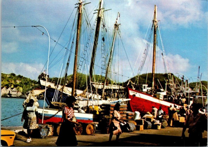 VINTAGE CONTINENTAL SIZE POSTCARD LOCALLY BUILT VESSELS OFFLOADING WARES GRENADA