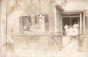 VINTAGE POSTCARD UNIDENTIFIED GROUPING OF WOMEN ON HOUSE PORCH REAL PHOTO c 1910