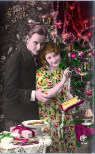 Postcard Christmas Joyeux Noel Photo tinted Couple at Christmas CEKO 1934 set 