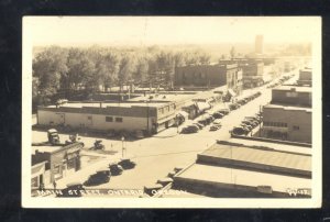 RPPC ONTARIO OREGON DOWNTOWN MAIN STREET SCENE OLD CARS REAL PHOTO POSTCARD