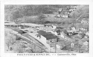 F26/ Garretsville Ohio Postcard c1940s Railroad Depot Pauls Feed & Supply