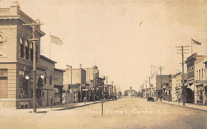 Cando ND Main Street Storefronts Old Cars RPPC Postcard