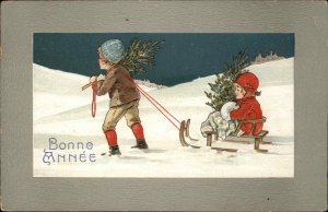 Bonne Annee New Year Children Sledding in Snow c1910 Vintage Postcard