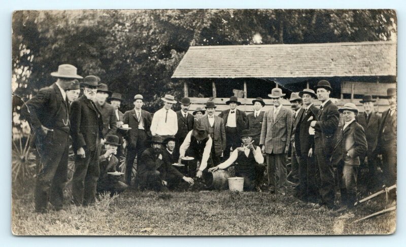 1910s Group Men Suits Eating Outdoors Wine Barrel Real Photo Postcard RPPC A2