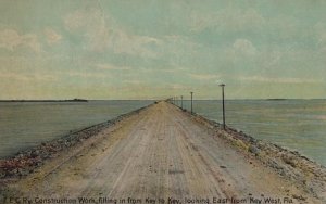 FEC RAILROAD CONSTRUCTION WORK KEY WEST FLORIDA POSTCARD (c. 1910)