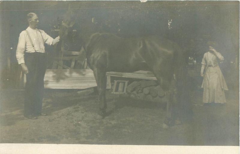 Man in Suspenders, Wife With Gibson Girl Hair, Horse Early 1900s RPPC