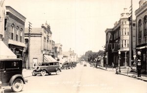 J70/ New London Wisconsin RPPC Postcard c40-50s Peral St Stores 29