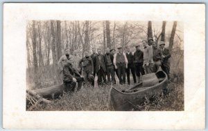 c1910s Large Group Men Outdoors RPPC Canoe Friends Sweater Boat Real Photo A261