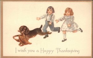 Dachschund Weiner Dog Steals Thanksgiving Turkey Children c1910 Vintage Postcard