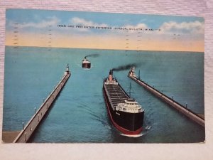 Boat Ship Postcard Duluth MN Iron Ore Freighter entering Harbor 1941 postcard