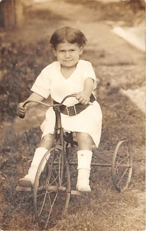 Child on tricycle Child, People Photo Unused 