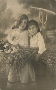 Postcard farmers's childrens basket boy girl young