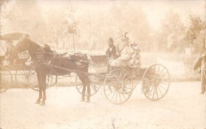 New Bremen Ohio Family Riding in Horse Wagon Carriage Real Photo PC AA69482