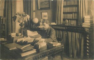 Belgian writer Léopold Courouble at his desk postcard