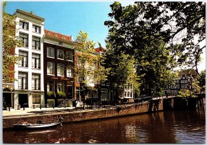 VINTAGE POSTCARD CONTINENTAL SIZE HOTEL SEVEN BRIDGES ON THE AMSTERDAM CANALS