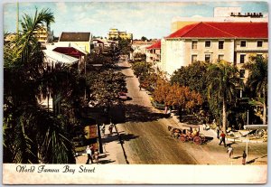 VINTAGE CONTINENTAL SIZE POSTCARD STREET SCENE ON BAY STREET NASSAU BAHAMAS 1967