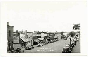 Lake City MN Main Street View Store Fronts Old Cars RPPC Real Photo Postcard