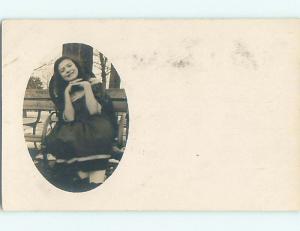 Pre-1918 rppc PRETTY GIRL POSING ON A PARK BENCH r5904