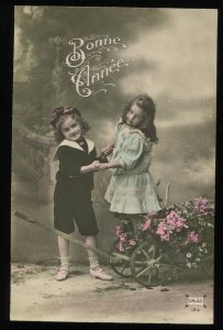 Bonne Annee. Happy New Year. Vintage French RPPC. Hand tinted. 2 children. Dales